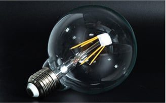 LED-Filamentlampe E27 rund 6W Bernsteinglas 2200K dimmbar