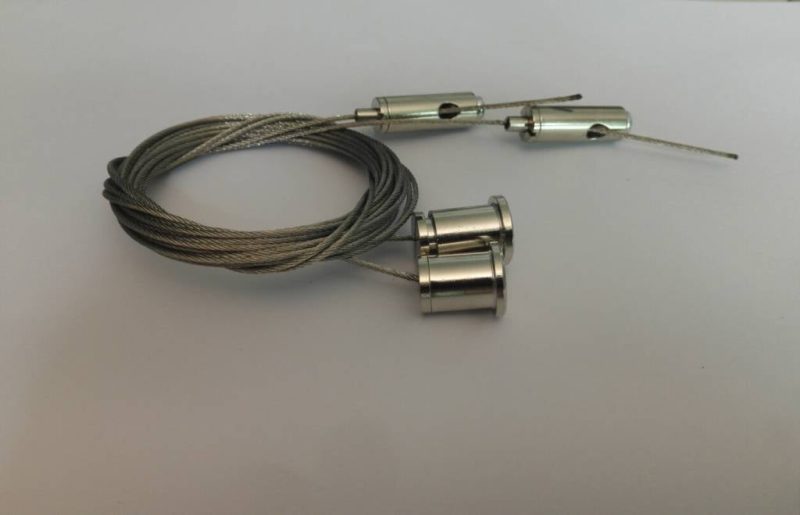 Suspension system for IP65 LED panels and flat IP65 LED fixtures